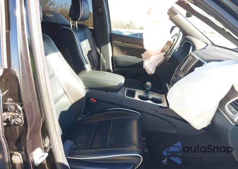 2014 Jeep Grand Cherokee Overland из США, поврежденный, VIN 1C4RJECG9EC351344